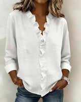 BRUNEL PARIS | Blouse à volants, col en V et manches longues
