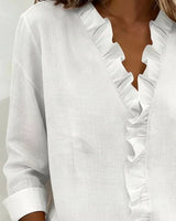 BRUNEL PARIS | Blouse à volants, col en V et manches longues