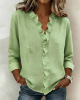 BRUNEL PARIS | Blouse à volants, col en V et manches longues