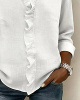 BRUNEL PARIS | Blouse à volants, col en V et manches longues
